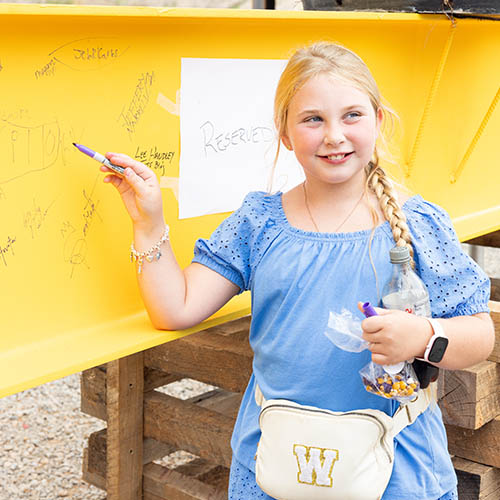 little girl signing beam