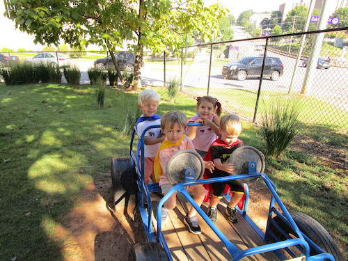 Children playing on dune buggy.