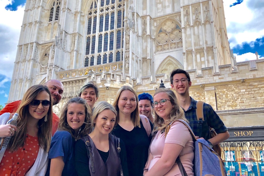 A group of students in front of Westminster Abbey in London