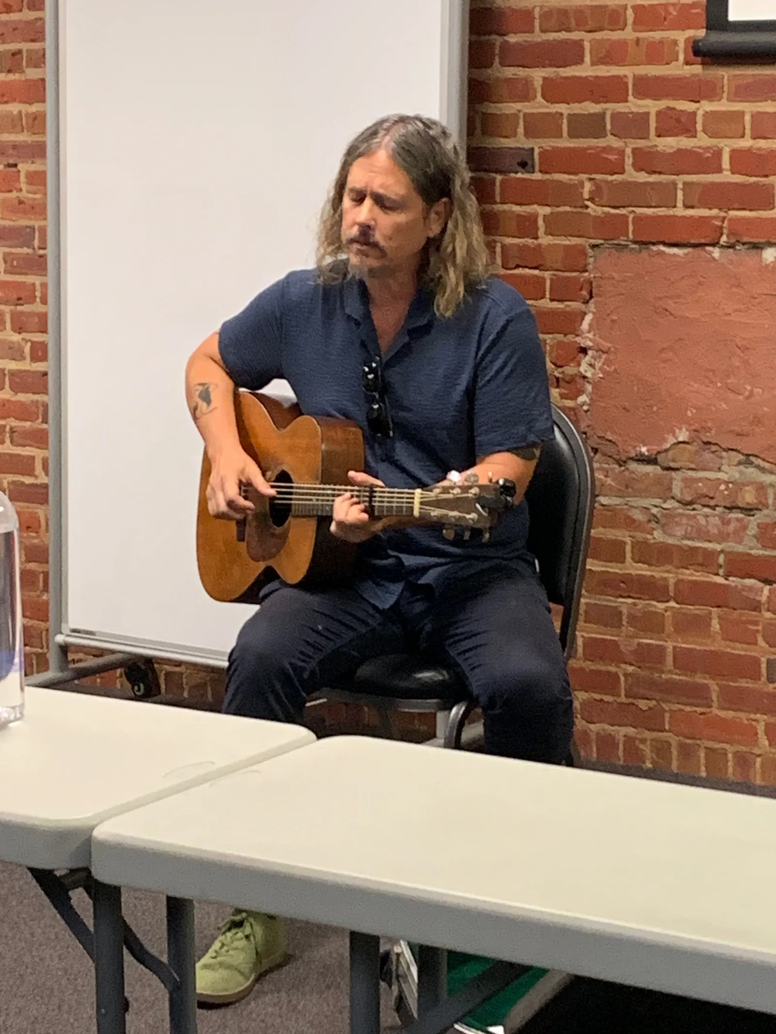 A guitar player sings #2