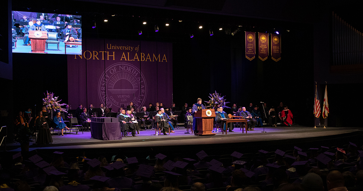 President Ken Kitts addresses the 2021 fall commencement audience in Norton Auditorium.