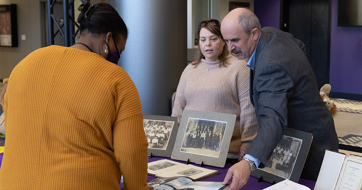University Archivist Volodymyr Chumachenko and Graduate Assistant Dixie Norwood shares Founders' Day materials with students, faculty, and staff at the 2022 Founders' Day celebration.