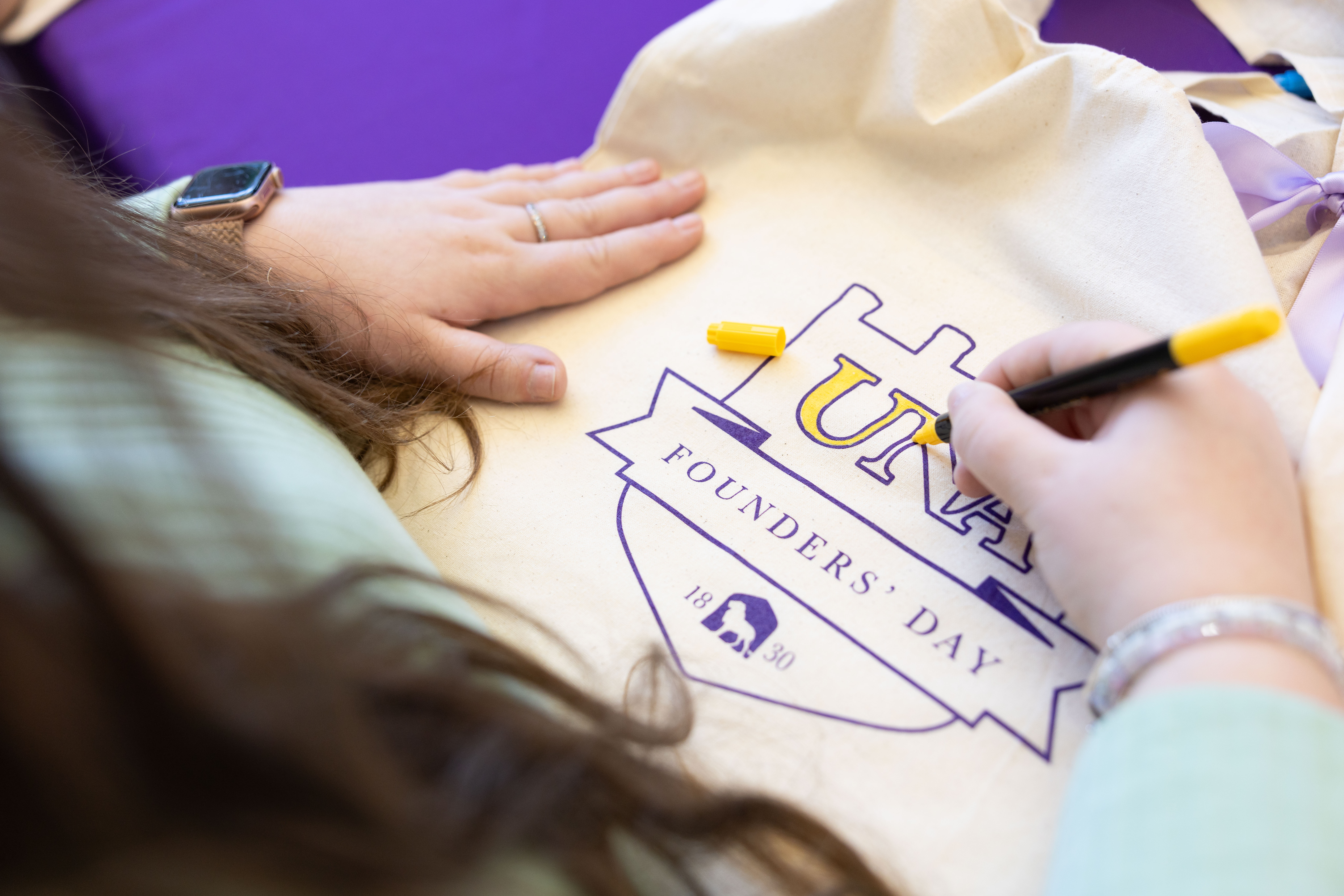 As part of UNA's Founders' Day commemoration Monday, students took advantage of the opportunity to decorate tote bags.