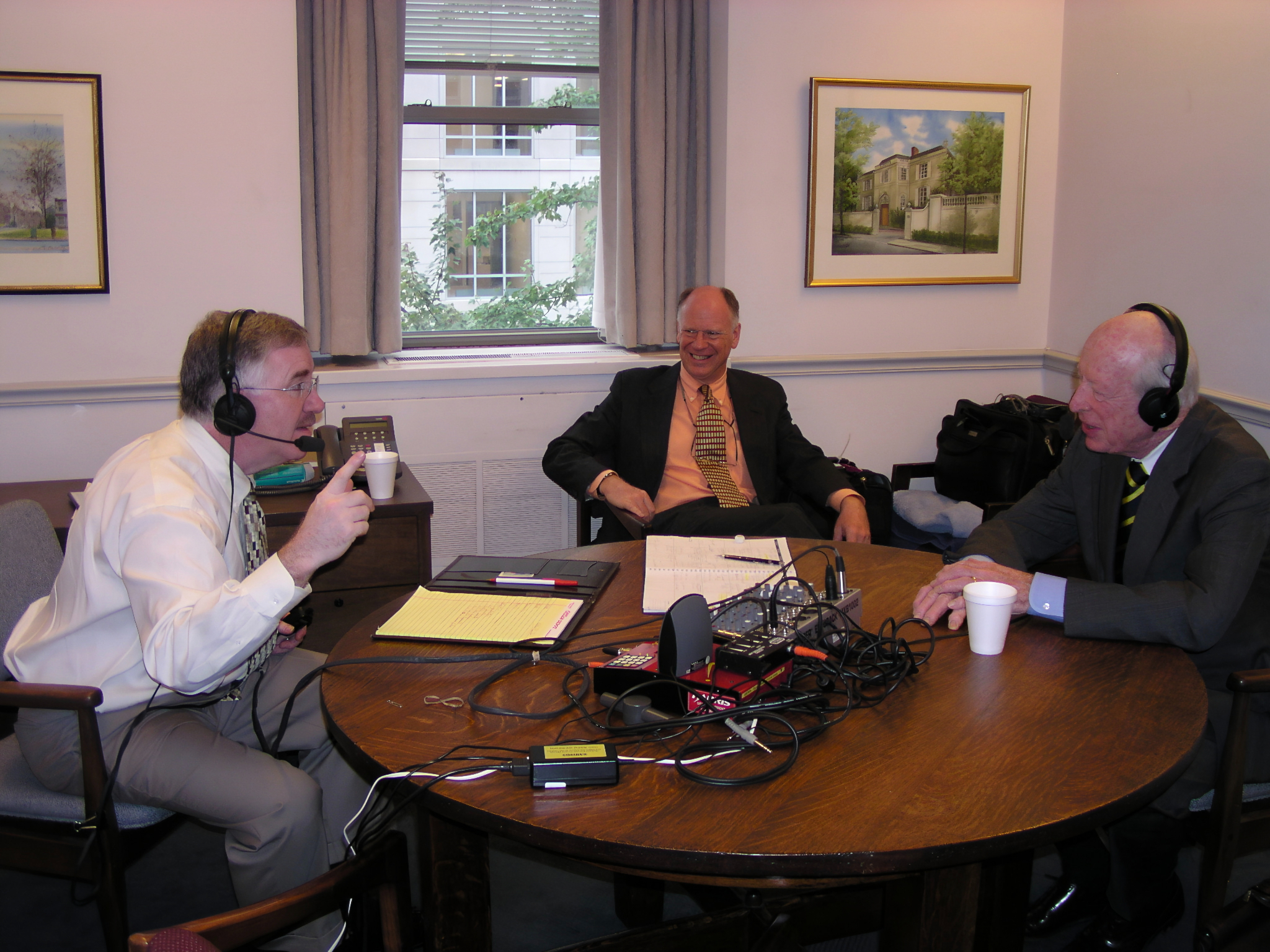 Mr. Blasingame, far left, is broadcasting from the Kiplinger Letter HQ in Washington D.C., as he interviews Austin Kiplinger, the 90-year-old son of the founder, and the grandson, Knight, in the middle, who he had just interviewed. 
