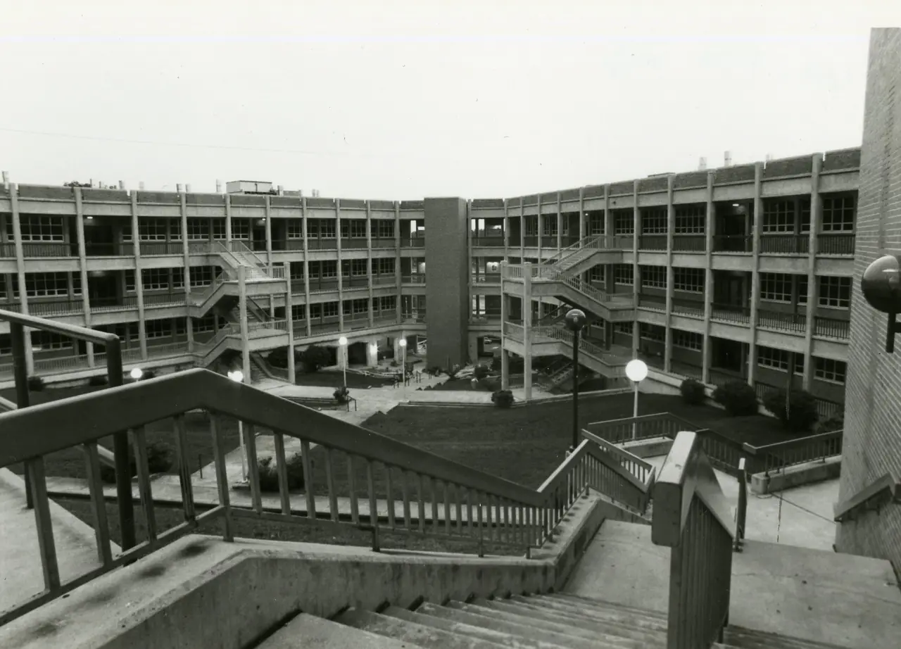 The courtyard of the Floyd Science Building, ringed by open walkways and exterior stairs